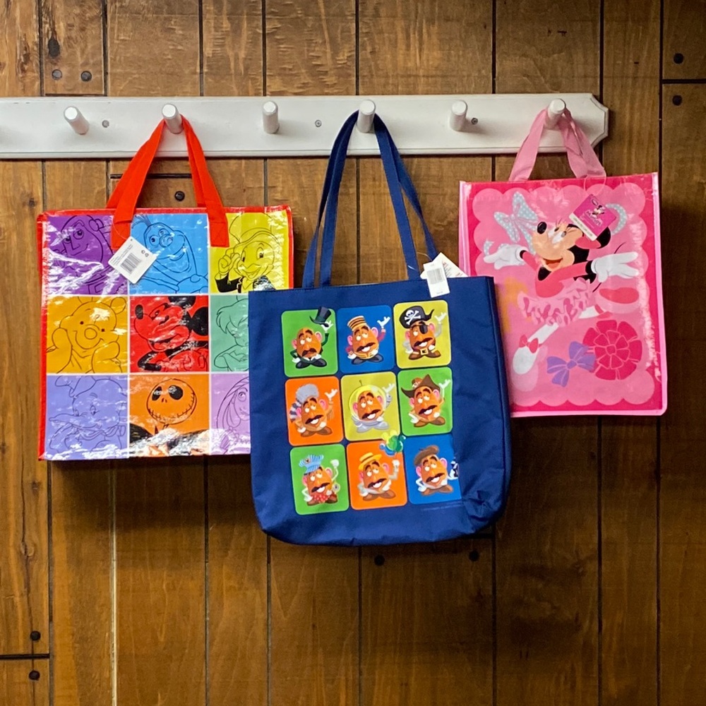 Three. Walt Disney world totes new with tags.